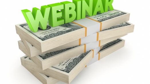 Word WEBINAR on stack of dollars.Isolated on white.3d rendered.