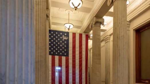 A US flag hanging at the corridor ceiling of US Capitol corridor ceiling, Interior, Washington DC.