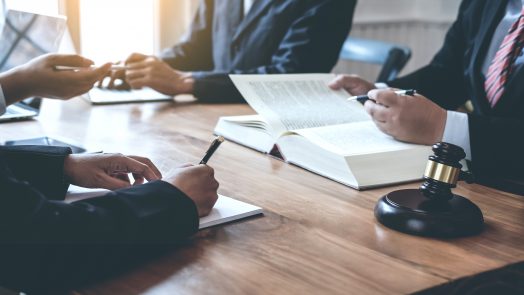 Business lawyer team. Working together of lawyer in the meeting.