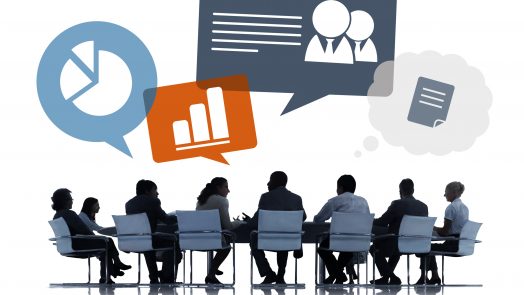 Silhouettes of Business People Discussing Business Issues