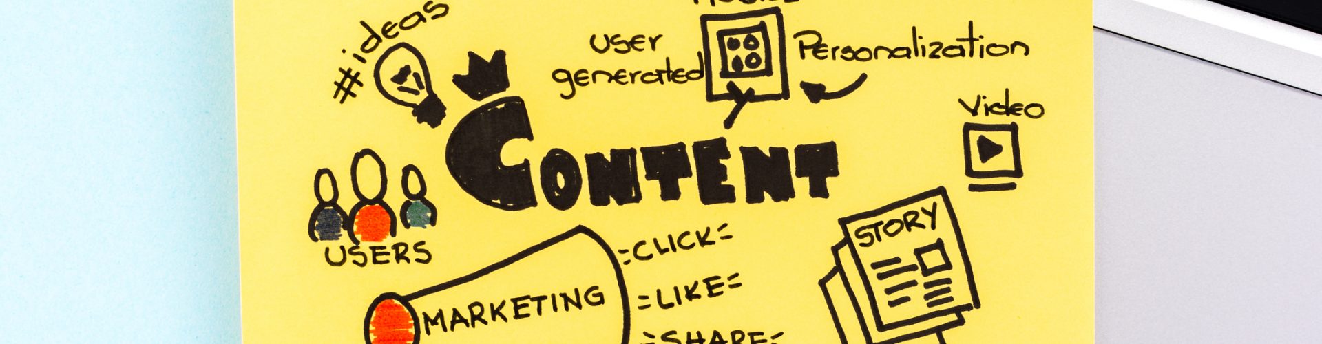 Internet content marketing sketch on blue background over notebook.