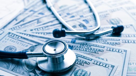 The cost of healthcare. Blue toned