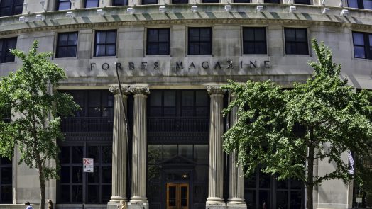 "New York City, USA - September 1, 2012: The office building of the well known Forbes Magazine located in Greenwich Village in Manhattan on a bright sunny Saturday afternoon."